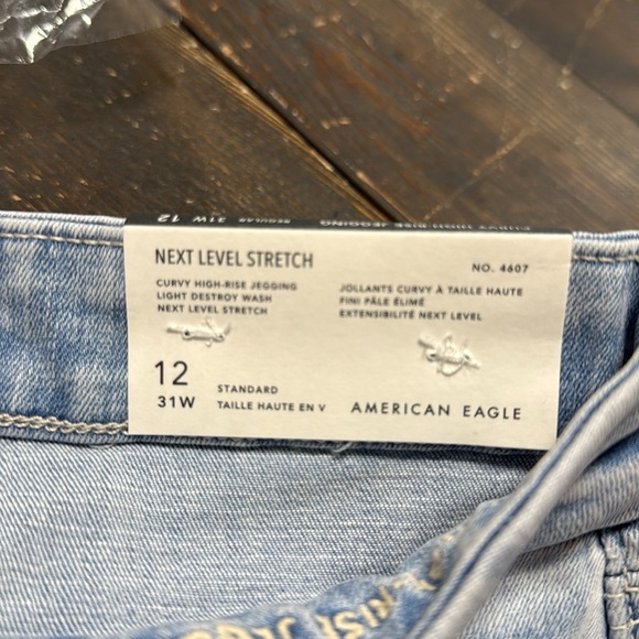 AMERICAN EAGLE NEXT LEVEL STRETCH CURVY HOGH ROSE RIPPED JEGGINGS - 12 31W - Picture 5 of 6